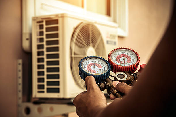Professional Heat Pump Repair technician working in Five Points, NC